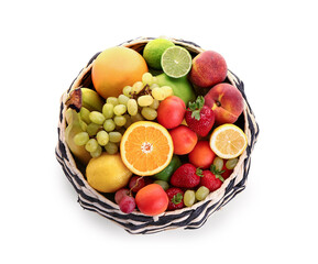 Bowl with different fresh fruits on white background