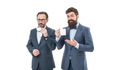 partners celebrate start up business isolated on white. business lunch. bearded men hold tea and coffee cup. businessmen in formal suit with drink. coffee break. Good morning. Morning tradition