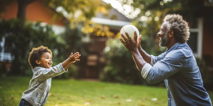 A father and son playing catch in the backyard