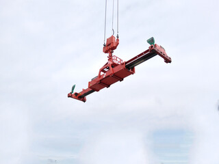 Crane spiders are used to lift containers.