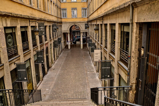 Lyon, France - November 11th 2021 : Covered passage Thiaffait, at the end of traboules. It's called "Village des cr&eacute;ateurs" (creators' village). It's a place for new brands with environmental care.