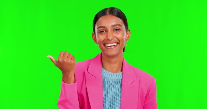 Face, green screen and Indian woman with promotion, pointing and presentation on a studio background. Portrait female person and model with hand, choice and deal with announcement with mockup space