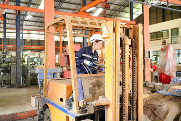 Industrial Engineer at work in factory, industrial engineers working at automated AI robotic production factory - New technology concept