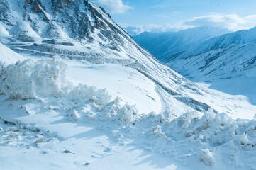 Fototapeta na wymiar Snow-covered peaks of Himalayas in Leh,Ladakh, on the way to Nubra Valley from Kardungla Pass