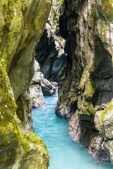 Crystal clear Soca river, one of the most beautiful european rivers, deep in the rocky canyon of...