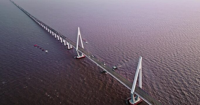Aerial view of Hangzhou Bay Bridge scenery at sunset in Jiaxing, Zhejiang Province, China. 