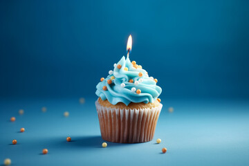 Tasty birthday cupcake with a candle on a blue background. Mini cake. Ai generative.