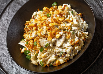Chicken Rice Casserole in black bowl, top view