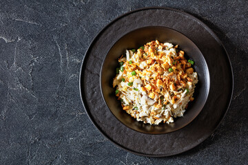Chicken Rice Casserole in black bowl, top view