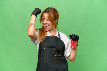 Butcher caucasian woman wearing an apron and serving fresh cut meat isolated on green screen chroma...