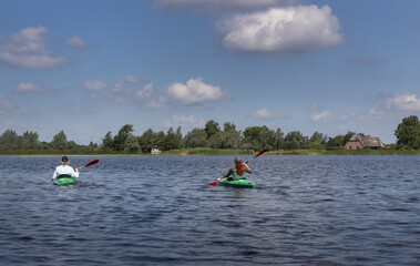 Canoe. Canoeing at Belt Schutsloot. Near Giethoorn. National park de Wieden and Weerribben. Kayak. Netherlands.