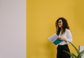 Young girl reading the documents