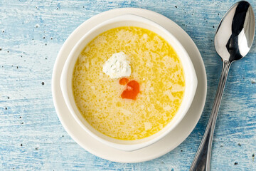 Seasoned fish soup on a white porcelain plate