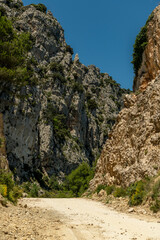 Pass del Comptador, the pass between Sella and Guadalest, small gravel mountain road used by cyclists, Costa Blanca, Alicante, Spain  - stock photo