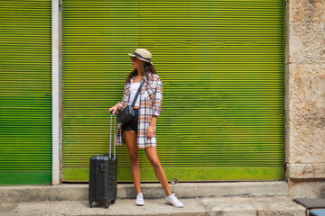 A woman wearing a luggage