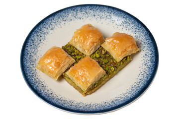 Pistachio baklava isolated on white background. Turkish cuisine delicacies. Turkish baklava. close up