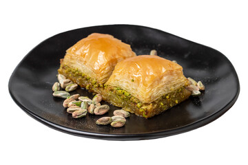 Pistachio baklava isolated on white background. Turkish cuisine delicacies. Turkish baklava. close up