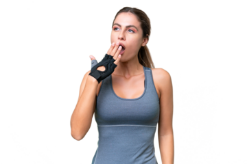 pretty Sport Uruguayan woman over isolated background yawning and covering wide open mouth with hand
