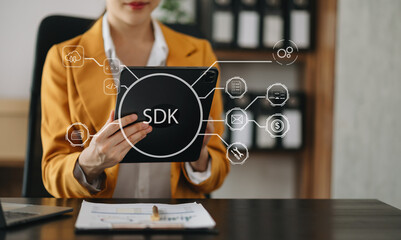 SDK  Software development kit programming language technology concept, Person typing laptop...