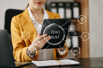 Zero trust security concept Person using computer and tablet with zero trust icon on virtual screen of Data businesses..