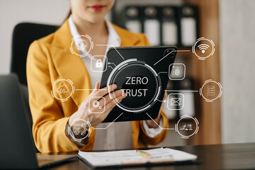Zero trust security concept Person using computer and tablet with zero trust icon on virtual screen...