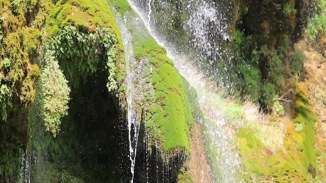 all green waterfall in termez