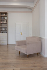 modern cozy soft interior design of a room with a bedroom and a home office in warm delicate pastel pink and beige colors