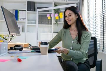 Portrait of young business friends gathered in a modern office conference room and worked as a team