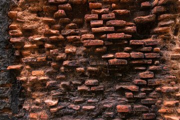 Old historical building brick wall grunge pattern texture can be used as a background wallpaper
