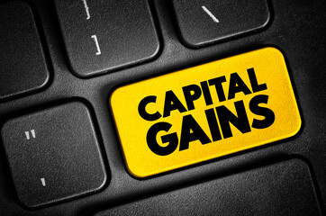 Capital gains - increase in a capital asset's value and is realized when the asset is sold, text button on keyboard