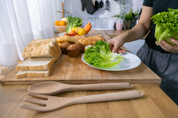young couple happily makes breakfast and sweet treats together.