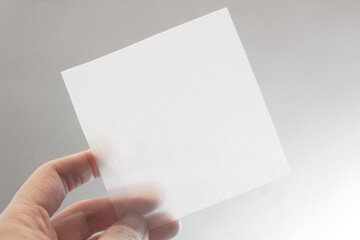 Obraz premium hand holding paper mock up 