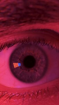 The macro view of human eye in darkness. slow motion