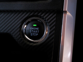Engine start button, modern car start and stop button.