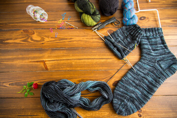 Set for hand knitting warm winter socks made of natural woolen yarn.
