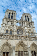 Fototapeta na wymiar Facade of Notre-Dame de Paris Cathedral