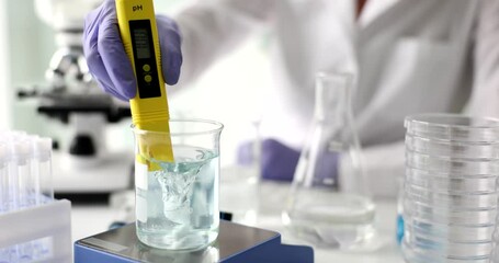 TDS meter checks the water quality in laboratory. Water quality tester and laboratory water purification system