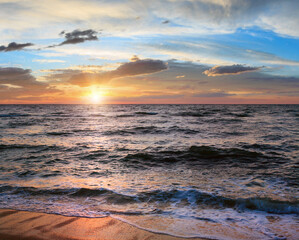 Fototapeta premium Sea sunset surf great wave break on coastline