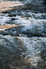water flowing over rocks