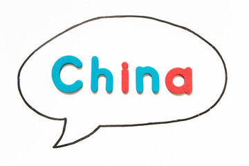 Alphabet letter with word china in black line hand drawing as bubble speech on white board background