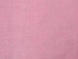 Texture of pink woolen fabric. Pink shawl made of wool, factory texture material