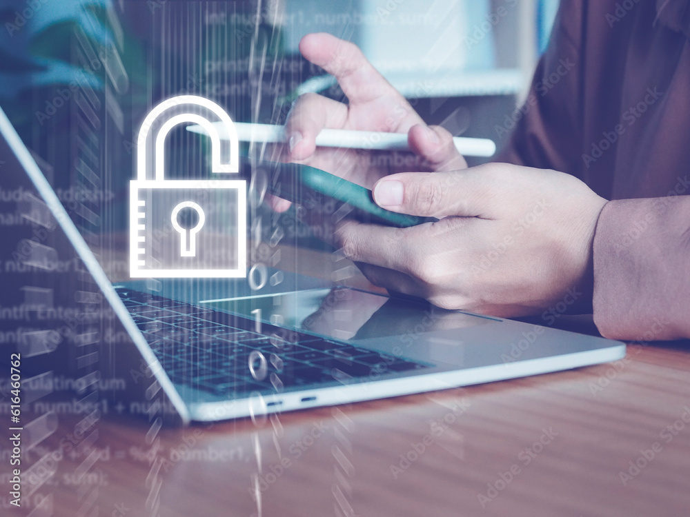 Wall mural cyber security, businessman using smartphone security to protect business data through a secure inte