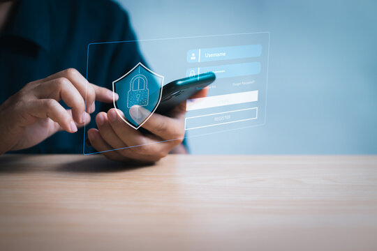 concept of cyber security Data protection with secure online access and data privacy protection, Businessman holding smartphone to passcode verify identity with protection icon on virtual screen - Powered by Adobe
