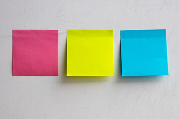 Blank sticky notes on wall