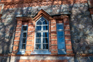 spring landscape with ruins of old church fragments, former Tänassilm Orthodox Church, Estonia