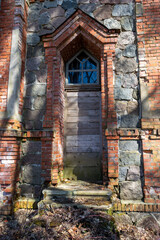 Fototapeta na wymiar spring landscape with ruins of old church fragments, former Tänassilm Orthodox Church, Estonia