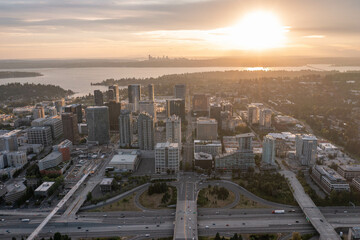 Naklejka na ściany i meble The City of Bellevue in Washington State Sunset With Dowtown Highrise in View from Above Drone Aerial Shot