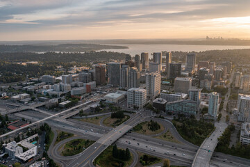 Fototapeta na wymiar The City of Bellevue in Washington State Sunset With Dowtown Highrise in View from Above Drone Aerial Shot
