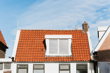 Village, white house with red tiles on the roof, countryside, life in a peaceful beautiful place.