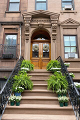 Fototapeta na wymiar Hoboken, NJ, USA, brownstone entrance, facade of the building, staircase leading to the door